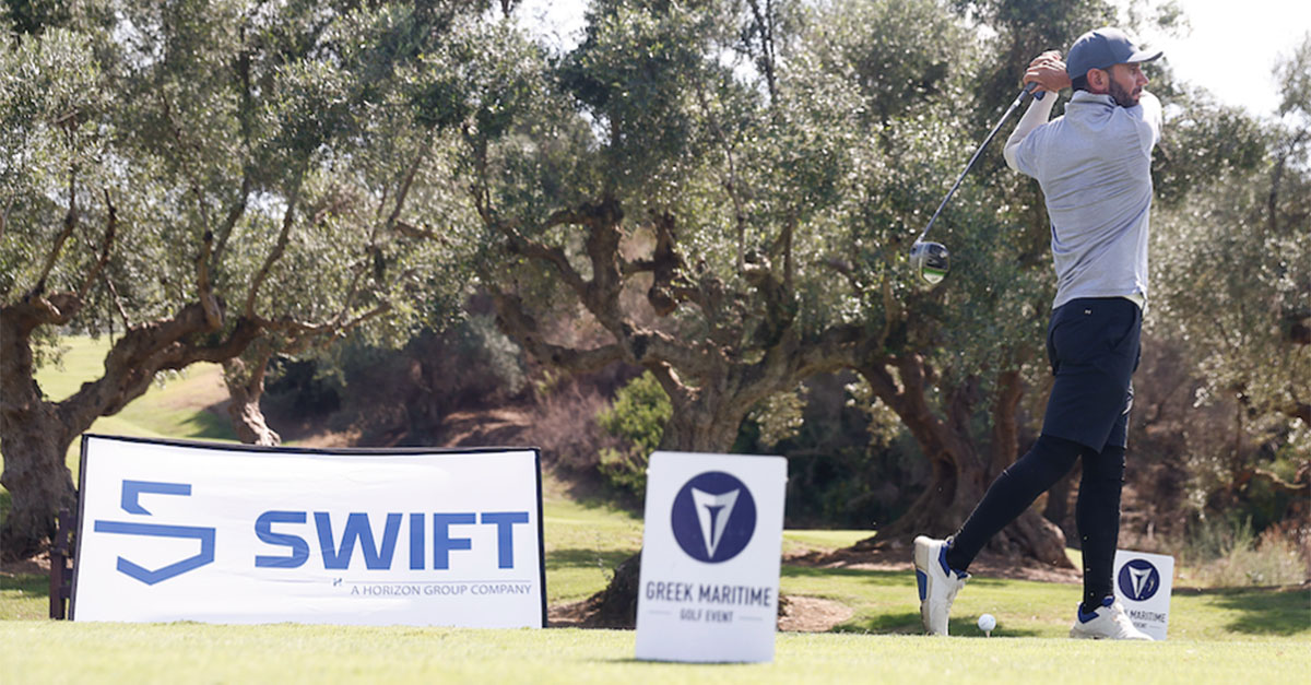 A man swinging a golf club with the Swift Marine logo in the background.