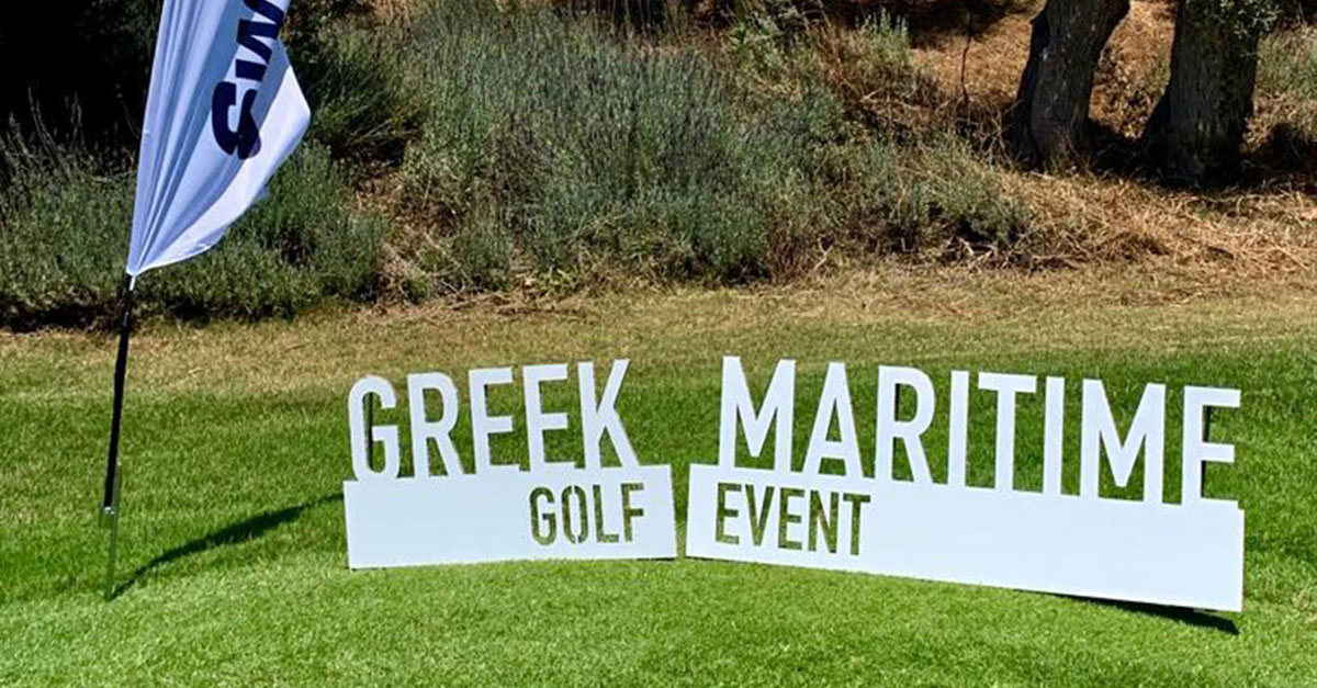 2019 Greek Martime Golf Event sigh outside on a golf course.